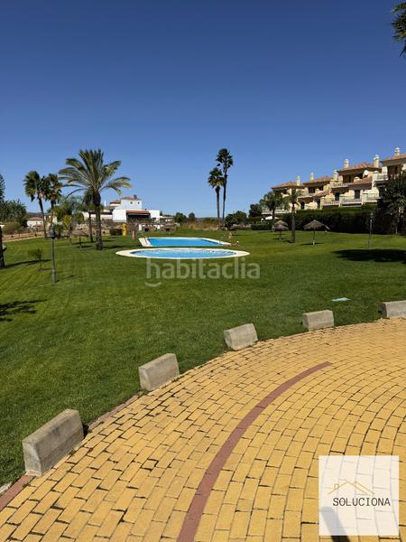 Foto 5944480b-64cc-4291-a44e-c59d98fbc278. Casa aparellada amb piscina a Costa Esuri Ayamonte