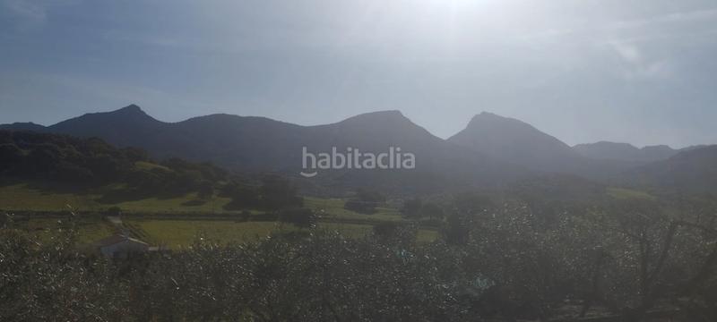 Foto fee4ff30-165f-4630-bdf5-605460403fa4. Finca rústica parcela rústica con casa, piscina montable y vistas a la sierra – 3145 m² de naturaleza y tranquilidad en Prado del Rey