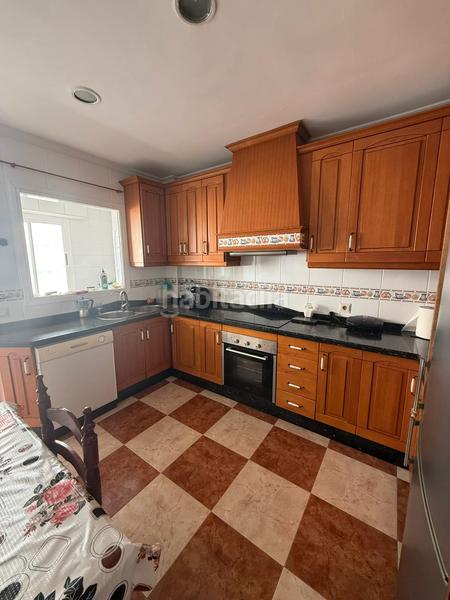 Foto 3dd569f8-8b84-4fe2-9313-77db83c26a5e. Casa aparellada a calle joaquín blume 25 a Roquetas pueblo Roquetas de Mar