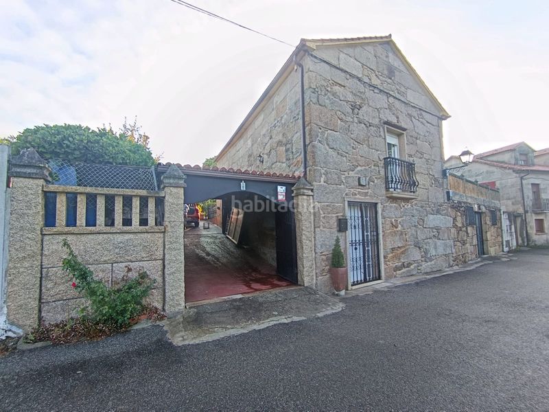 Foto a988dcef-3874-40e3-b3b2-f1d1aaaa0a4f. Casa amb aparcament a Cambados
