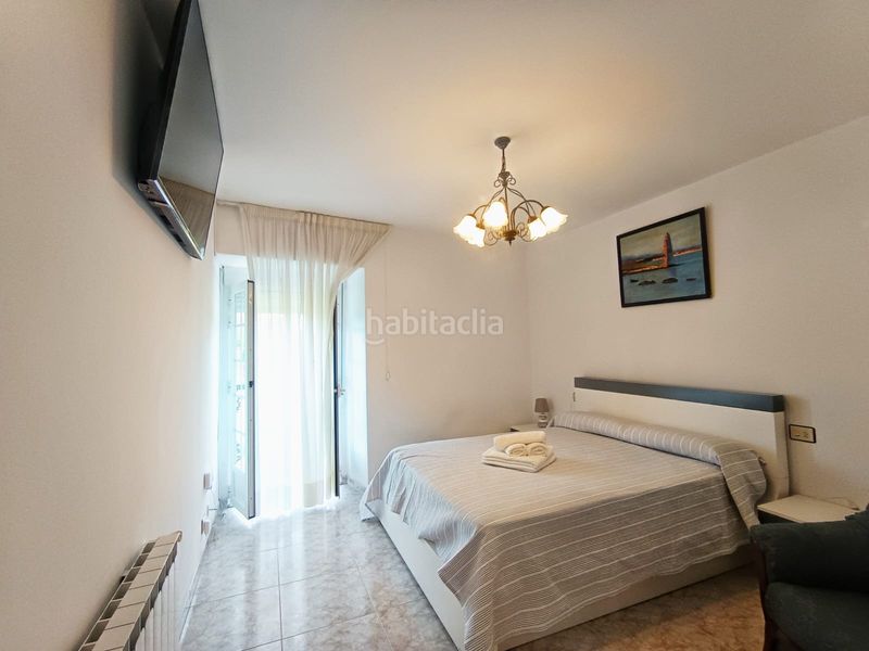 Foto fdb1c86c-0ad3-4c42-96a3-61e654843de3. Casa amb aparcament a Cambados