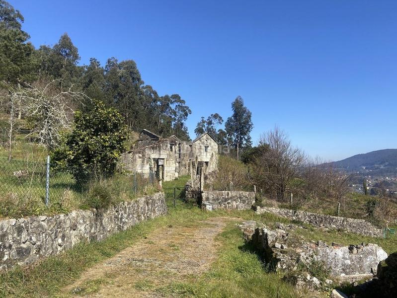 Foto b49a48fd-992f-4355-a3ee-c40adff5bcd5. Residential plot in outeiro 18 in Vilaboa