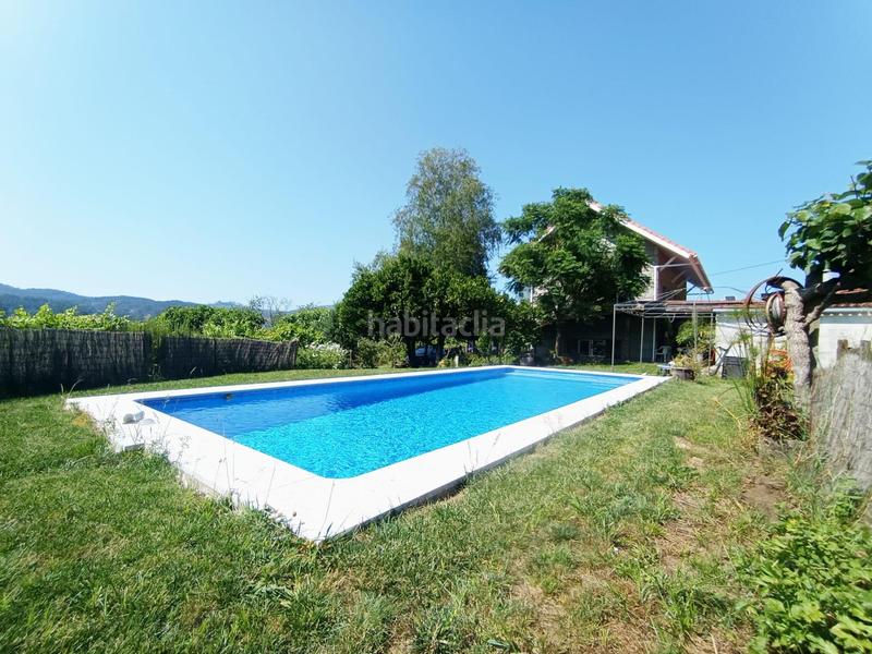 Foto b88f2e31-b661-4e9d-b99d-ed148b14edbb. Casa  con piscina en Portas