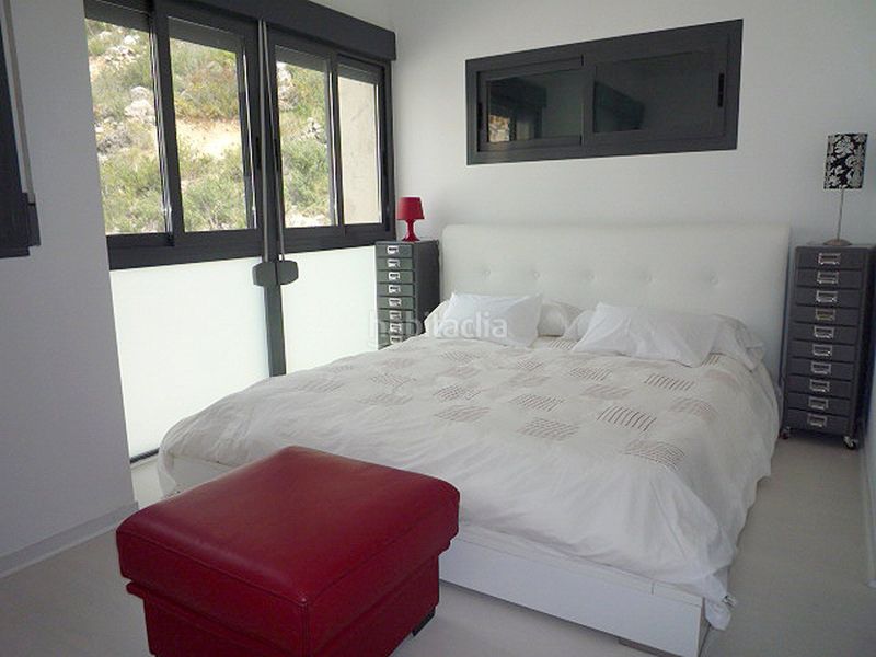 Foto 4c55e0e7-74d7-4fb0-b801-75008e7460a3. Casa adossada a Pueblo Calp