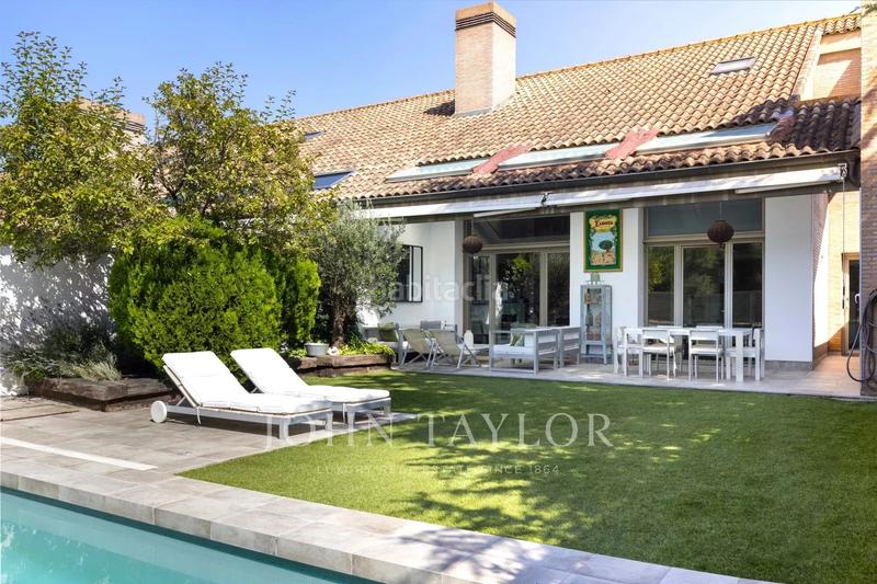 Foto 239dc0a6-4316-4a15-a2b4-f40a8d9ef901. Maison jumelée avec chauffage parking piscine dans La Finca Pozuelo de Alarcón