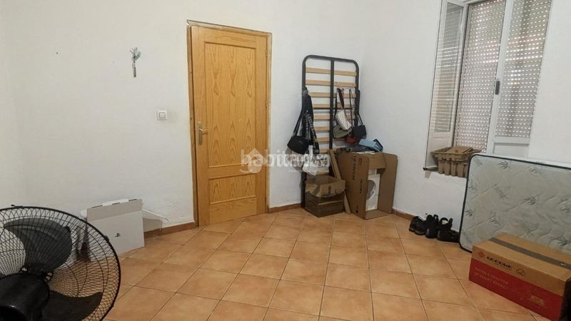 Foto 07239d33-bf2f-4104-83cf-5b74131ac3d5. Casa aparellada a Carolina (La)