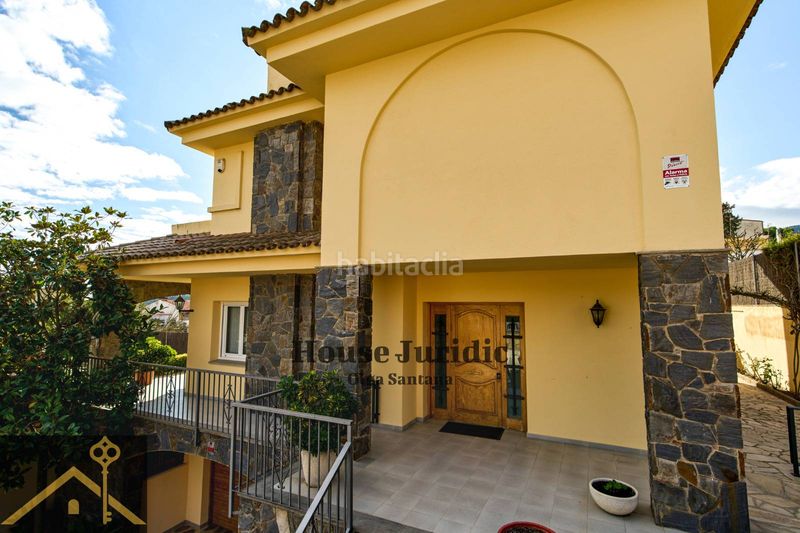 Foto bac9213c-90e0-4634-80fc-2e866212b945. Casa con camino riscaldamento parcheggio piscina in Argentona