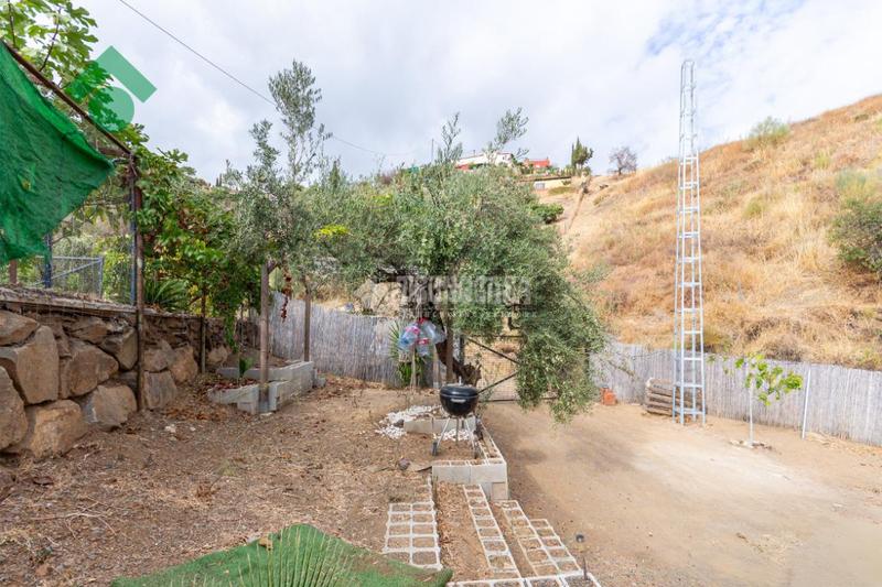 Foto c76883d4-bc70-456b-9f6e-09eef5064bdd. Finca rústica a Benagalbón Rincón de la Victoria