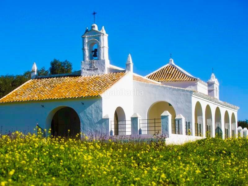 Foto 1f5a567d-b8fa-4c5c-9d8c-6b7a5bf0f244. Finca rústica parcela rústica con vivienda, instalaciones ganaderas y licencia zoológica en Castilblanco de los Arroyos