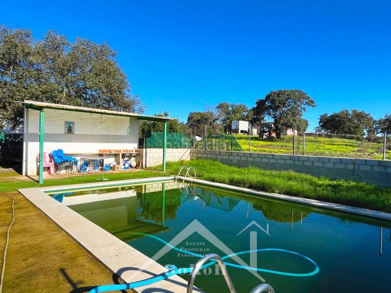 Foto c5ecb636-336e-4633-918a-6ffe28506370. Finca rústica parcela rústica con vivienda, instalaciones ganaderas y licencia zoológica en Castilblanco de los Arroyos