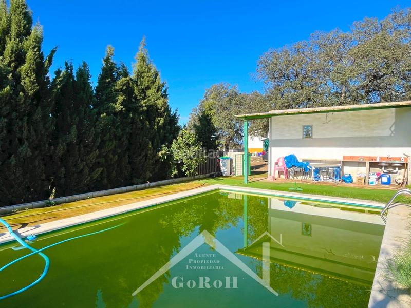 Foto d7cfd45e-cfff-4f8f-9eef-b8616883da14. Finca rústica parcela rústica con vivienda, instalaciones ganaderas y licencia zoológica en Castilblanco de los Arroyos