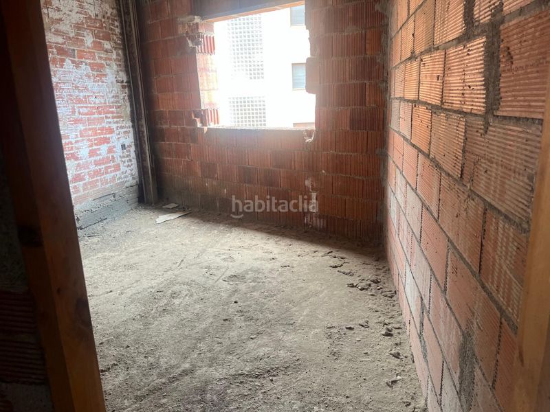 Foto b91f78e6-4991-48ff-94c2-eae80f548a5e. Edificio promoción por terminar. edificio completo a medio construir en Arbúcies