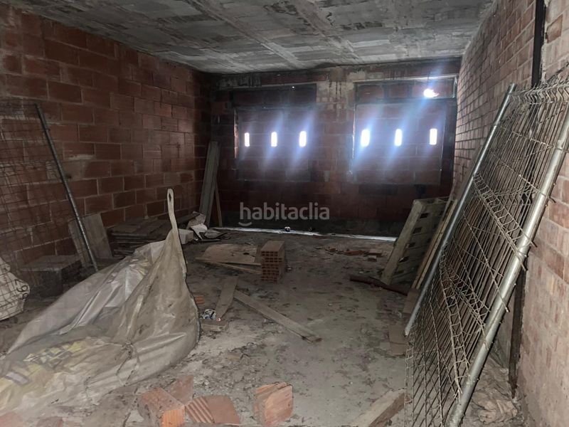 Foto c1f9fd32-7163-4ca4-a533-daadbeda7a52. Edificio promoción por terminar. edificio completo a medio construir en Arbúcies