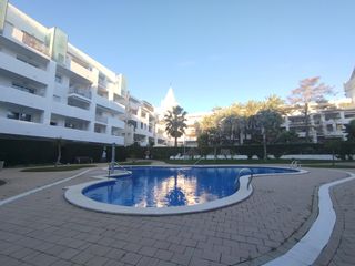 Apartament  12 carrer port joan #planta baja. Bonito y moderno apartamento con jardín privado y piscina comuni