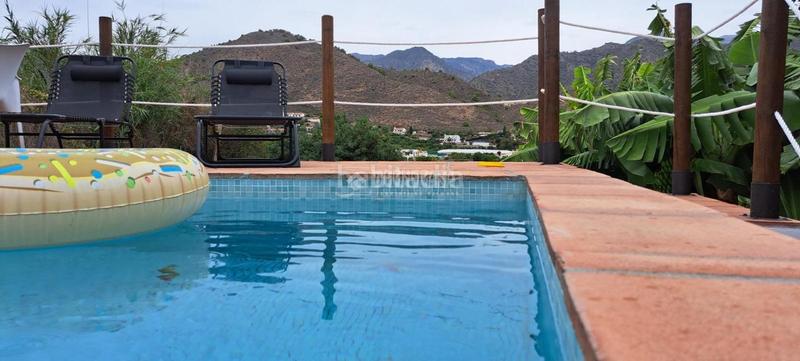 Foto ca434f6f-51fe-4da1-a129-edfe93a776db. Location mas avec parking piscine dans Frigiliana