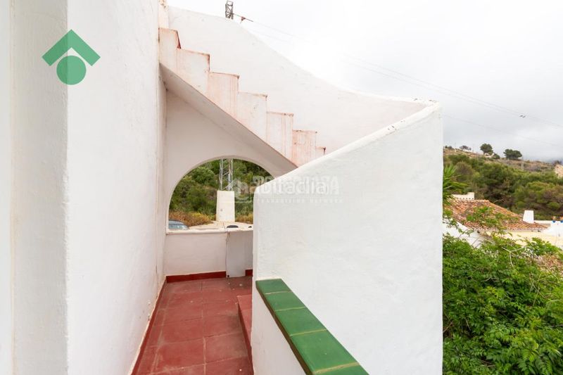 Foto 29eda0d4-2d63-410e-b718-2c342299ad2f. Casa aparellada amb aparcament a Capistrano Nerja