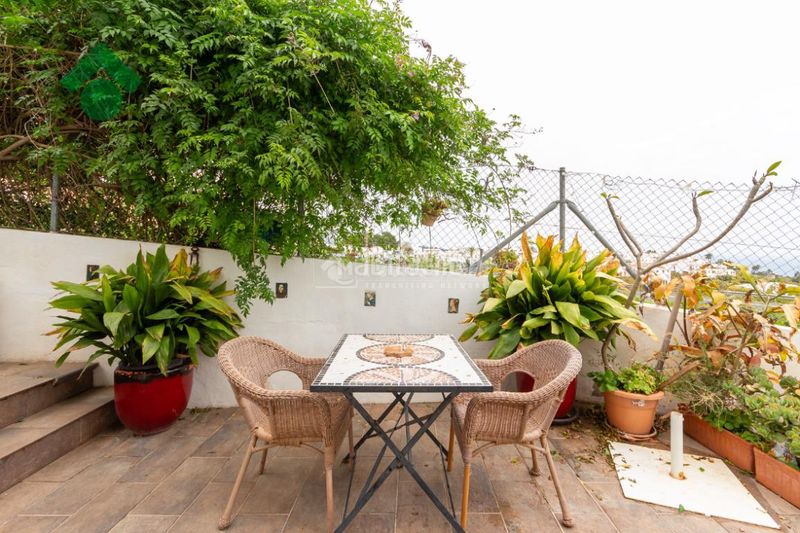 Foto a9af7d82-d956-4ed2-ae2f-36247c8acca9. Casa aparellada amb aparcament a Capistrano Nerja