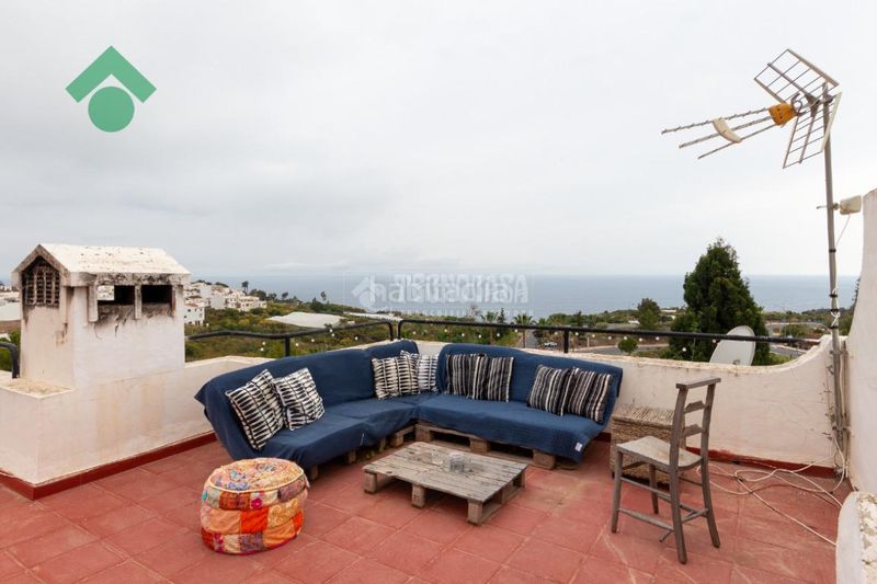 Foto c57587fd-8ab6-4189-9829-2168b519a386. Casa aparellada amb aparcament a Capistrano Nerja