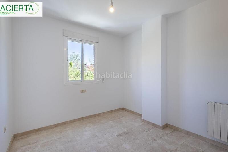 Foto 46a04392-7478-442e-8dcd-fb6fcead3936. Flat with heating parking in Rosaleda - Juventud Granada