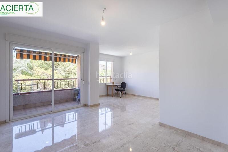 Foto 74018de0-091a-47c0-a832-b23e6d626b4c. Flat with heating parking in Rosaleda - Juventud Granada