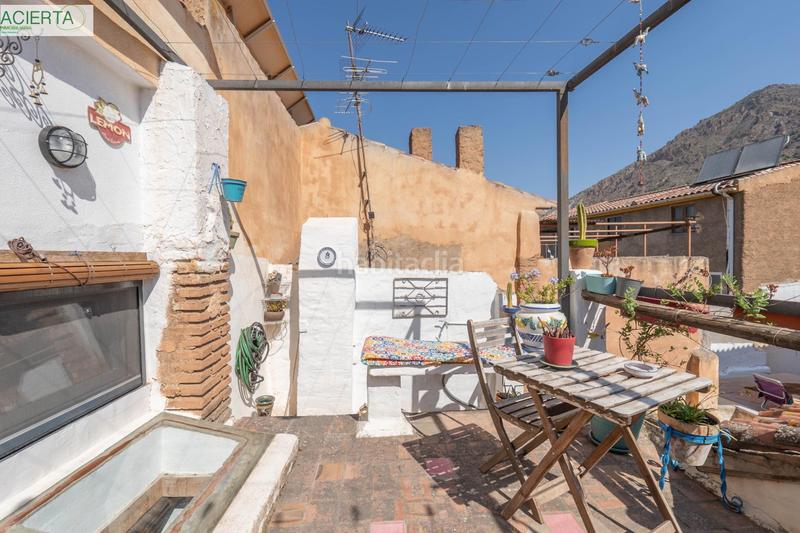 Foto bd725da7-a3b0-4b6e-a1d3-a6594b51ad0f. Casa adossada amb calefacció a Nigüelas