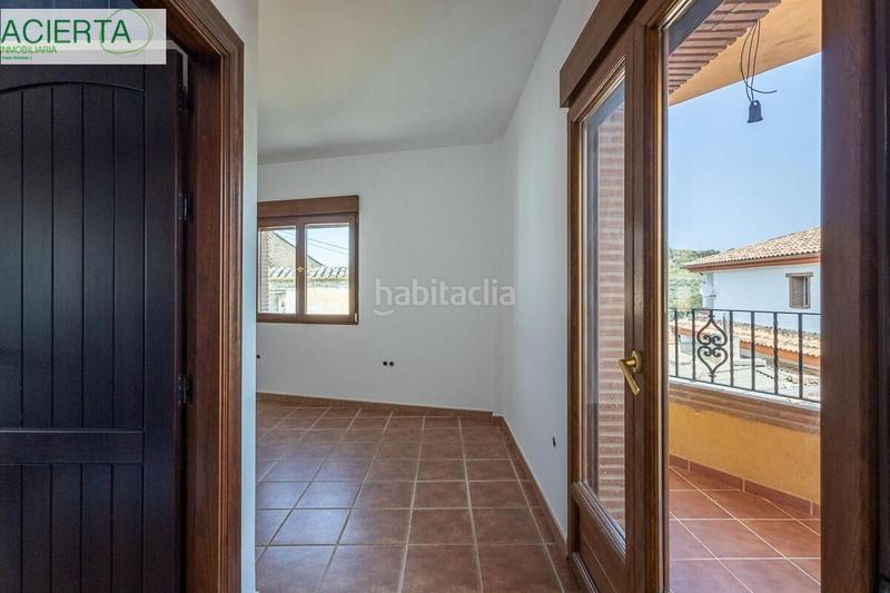 Foto f21fee4b-d90a-4e55-b2c2-f0906e420841. Maison avec parking dans Beas de Granada