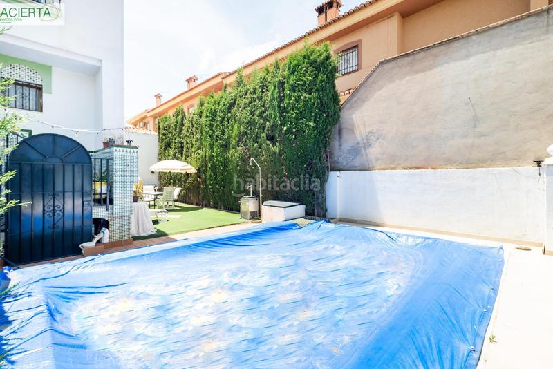 Foto eb71305b-7e55-4d63-8ce6-d5f488264100. Casa pareada tu nuevo hogar amplitud, comodidad y una zona exterior de ensueño en Churriana de la Vega