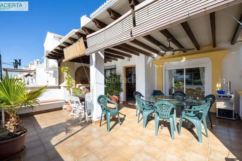 Foto f5391b5f-d750-413b-beaa-4ae39781bc3d. Casa aparellada a Calahonda - Carchuna Motril