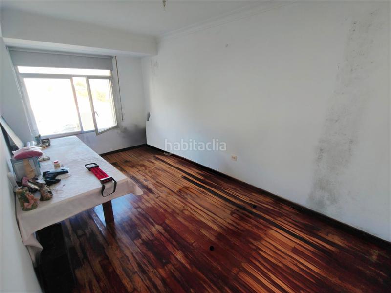 Foto 8674b59a-d90a-4240-98ad-9cd61d6bc413. Pis amb calefacció aparcament a Cariño