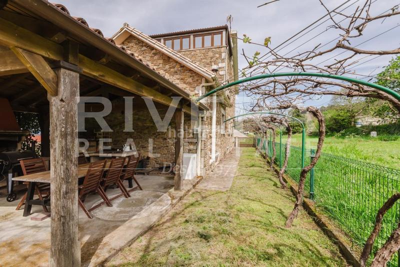 Foto a3778873-522f-4b68-9f8d-8877f1d1e37e. Casa amb calefacció aparcament a Nantes Sanxenxo