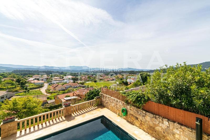 Foto 17af8d3e-dcf9-4c14-bd9f-18320b3c7c2c. Haus mit heizung parking pool in Rosal (O)