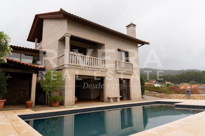 Foto 1a17d76a-e147-4bc7-b5f3-d94b74c86842. Haus mit heizung parking pool in Rosal (O)