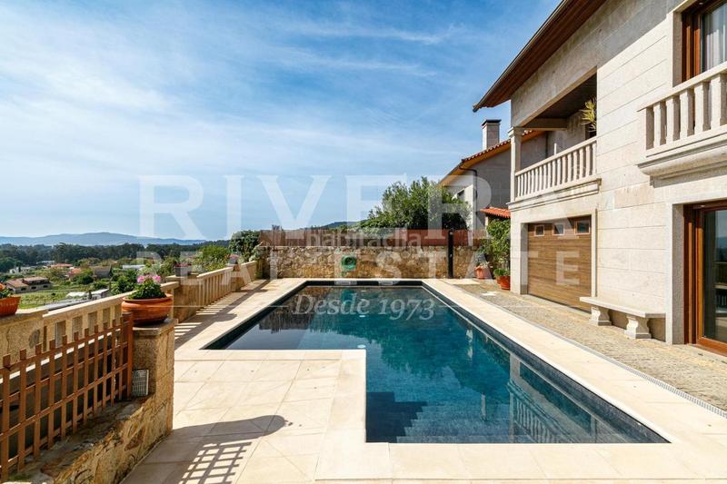 Foto 5e283673-8342-4c7e-9591-41d0d40d9859. Haus mit heizung parking pool in Rosal (O)