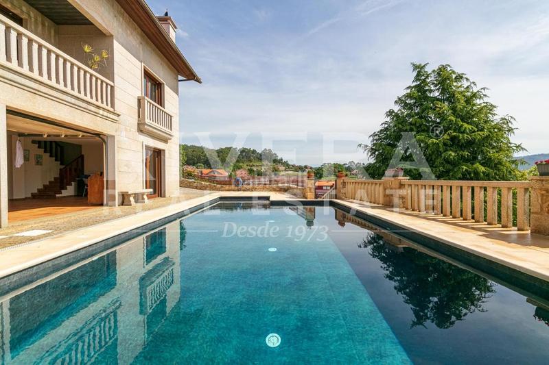 Foto 87abfb84-2529-4845-b63f-db3988ee81ff. Haus mit heizung parking pool in Rosal (O)