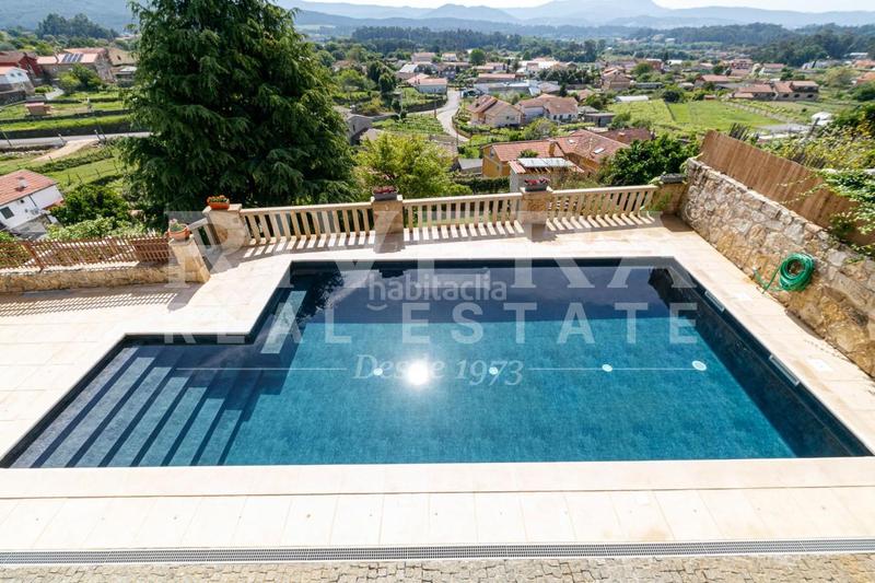 Foto b3232a0a-de45-421e-af90-40b823710d3d. Haus mit heizung parking pool in Rosal (O)