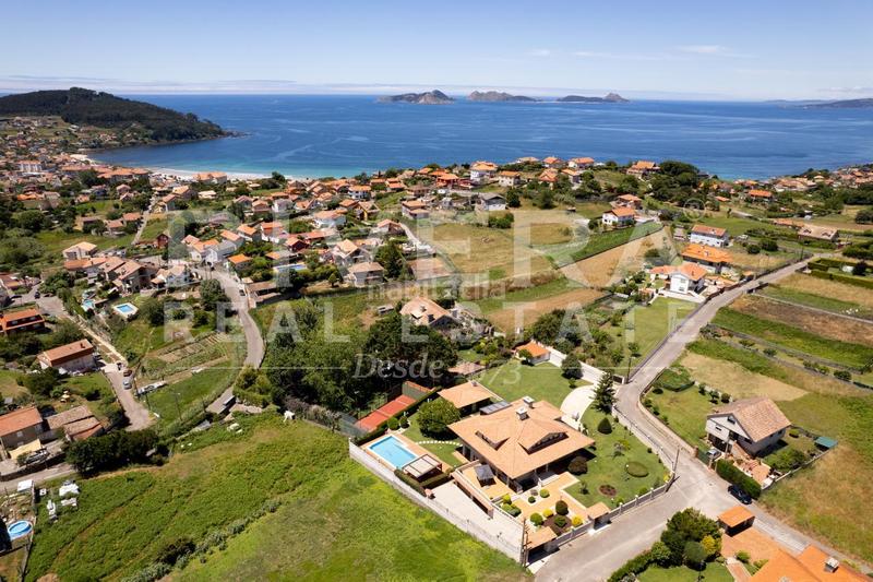 Foto 0ae7b3f8-4d8d-4b59-9455-b0b6fd42104f. Chalet mit heizung parking in Panxón Nigrán