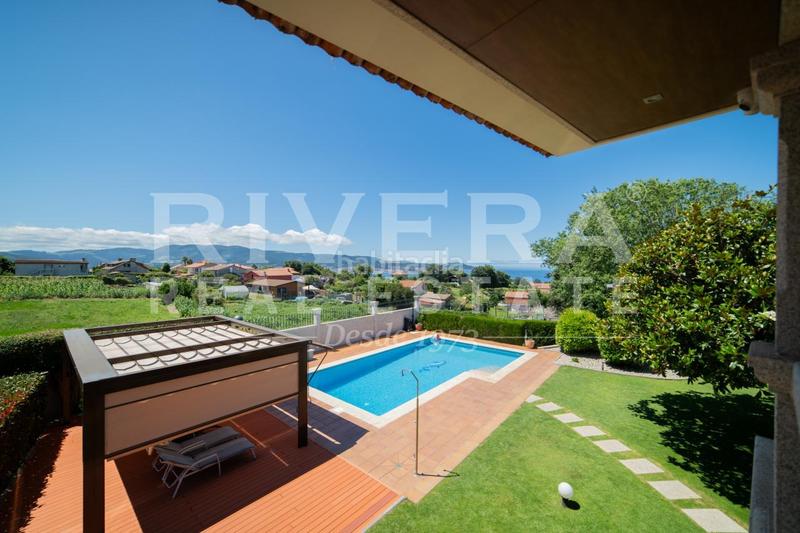 Foto f49d3707-bf15-4915-904a-b2aaae2ca15e. Chalet mit heizung parking in Panxón Nigrán