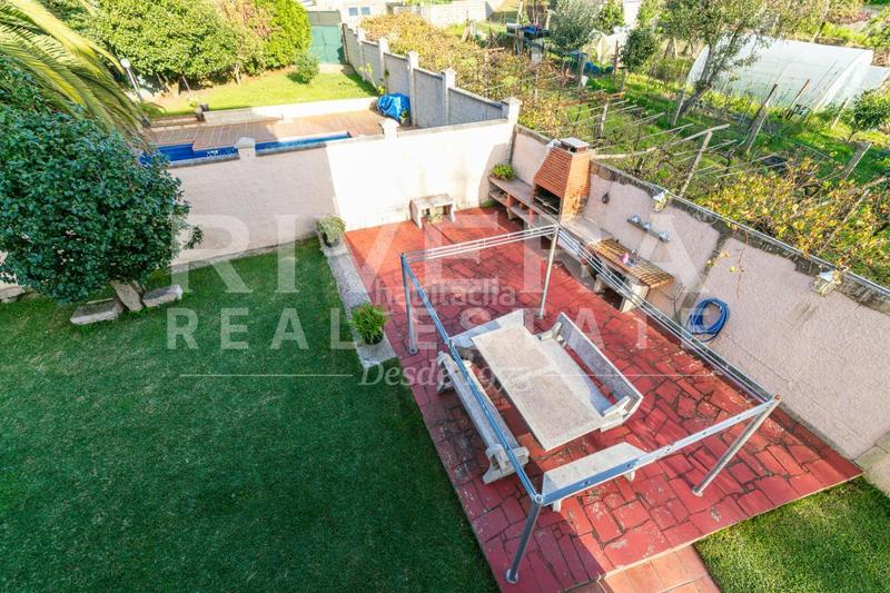 Foto 5d2dce9b-1e27-47c1-9b99-1fc2f2b5de0c. Casa en Bembrive Vigo