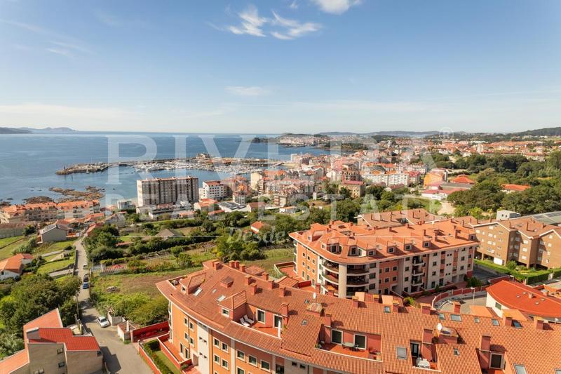 Foto 4fd2b47c-e761-41f2-8b1f-f923b47f7cbc. Appartamento con riscaldamento parcheggio piscina in Sanxenxo