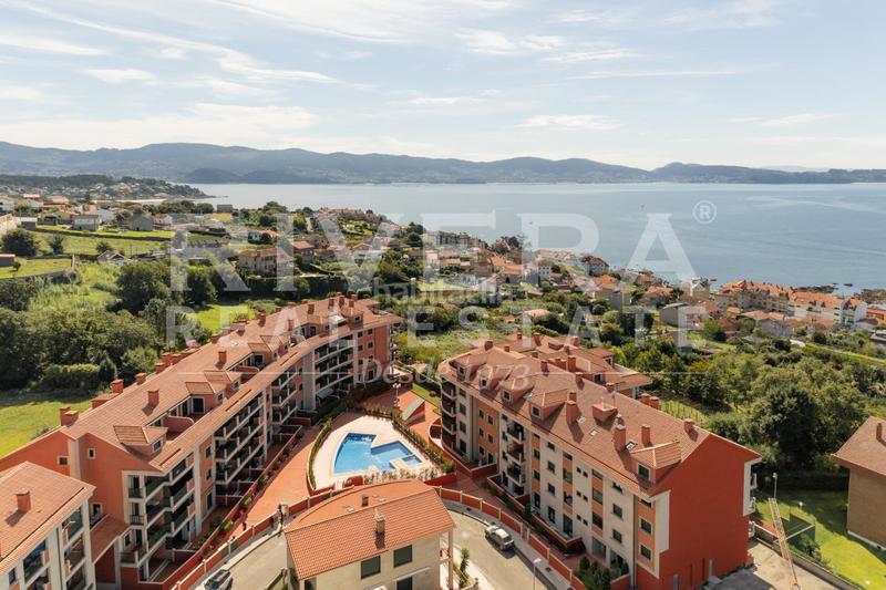 Foto 74aca257-9d40-4ba3-b61e-570830c3b17e. Appartamento con riscaldamento parcheggio piscina in Sanxenxo