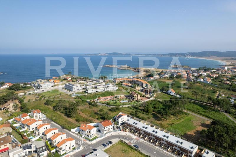 Foto e5a0be86-751a-4535-baa5-056920555586. Casa pareada en Noalla Sanxenxo