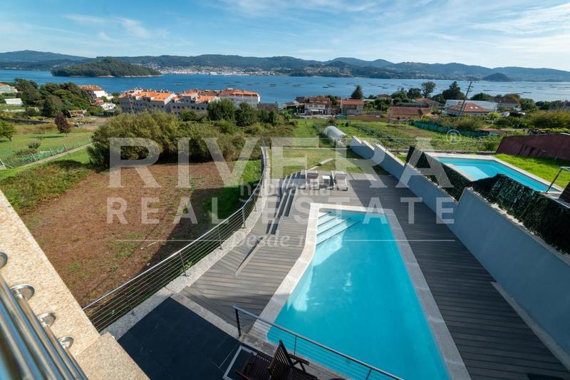 Foto 9f40c488-a378-4919-a203-95671d34fe8e. Chalet avec chauffage parking piscine dans Poio