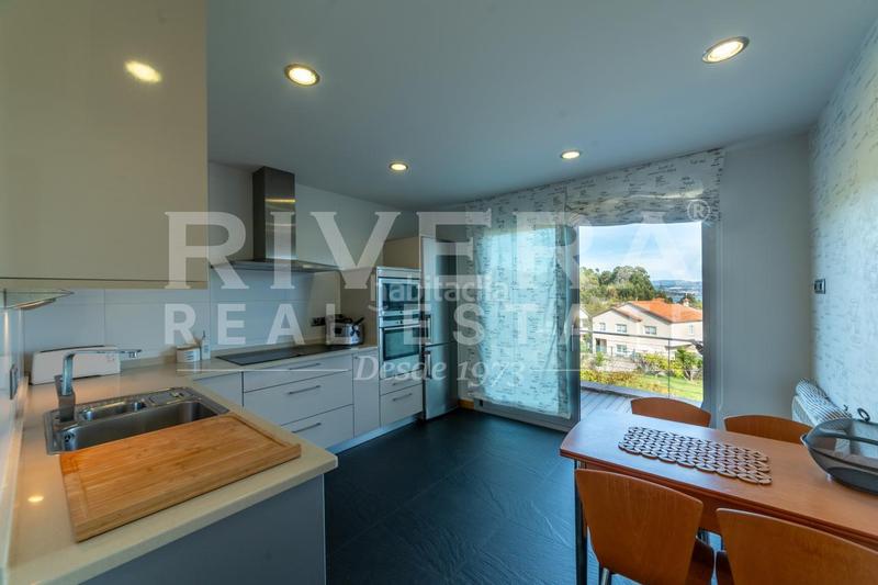 Foto f38097db-5d01-4500-88f7-632a0eb72db0. Chalet avec chauffage parking piscine dans Poio