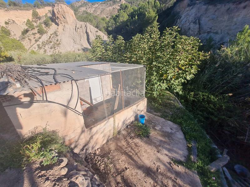 Foto 63263d7f-1a99-48ba-9362-57e9f40d6d12. Masia amb xemeneia aparcament a Orxeta