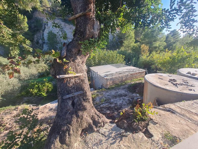 Foto ba20674c-97ad-482a-b14a-80d6173101d0. Masia amb xemeneia aparcament a Orxeta