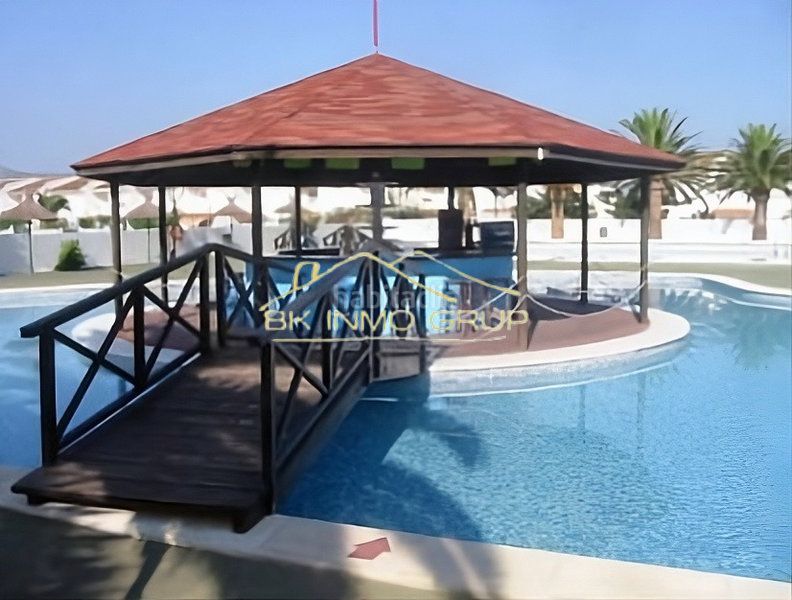 Foto 5a6e09af-3e18-431c-bad3-83cbc5567a2c. Apartament amb xemeneia piscina a Playa Norte Peñíscola