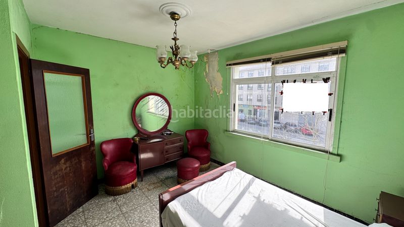 Foto 231a8944-32a3-485b-af56-4a6faeecabe1. Casa amb aparcament a Oseiro Arteixo