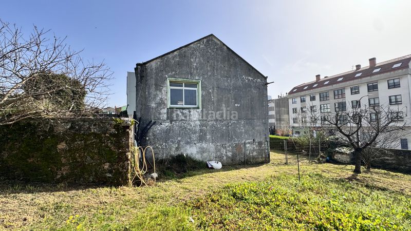 Foto 51323056-e4fe-4d7c-955c-fd598057b6bf. Casa amb aparcament a Oseiro Arteixo