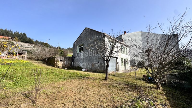 Foto 555ce43a-e6a4-4ca8-ae66-05e5a7a947ee. Casa amb aparcament a Oseiro Arteixo