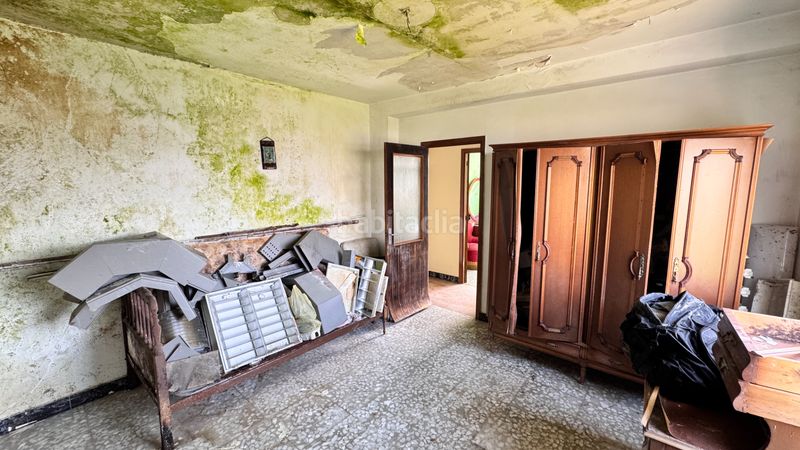 Foto a6e89a1b-5818-4e7e-9f19-922597753a17. Casa amb aparcament a Oseiro Arteixo